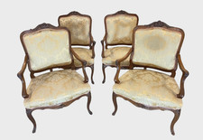 Quatre fauteuils style Louis