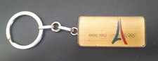 Keychain badge bid of Paris for the Games of the XXVe Olympiad Jo Paris 1996