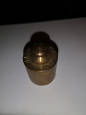 Petit poids de 100 g en laiton