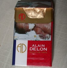 Tobacco pack empty cigarettes ALAIN DELON very good condition CAMBODIA CAMBODIA lilies
