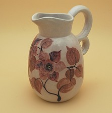 Beau pichet à double anse en