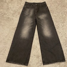  13oz denim with carabiner belt loop. wide leg baggy fit, and cool distressing.