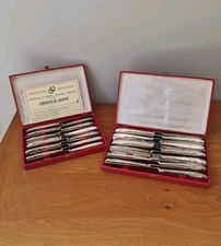 Couteaux en métal argenté 12