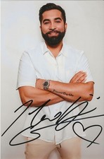 Autographe sur photo de Kendji Girac ( 19 x 12,5 )