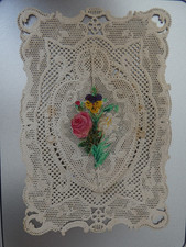 pious image lace scissor with floral shutters: on picture cross heart arrow