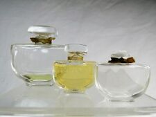 Caron, series of 3 antique bottles: "Seed flowers"