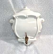 Vintage White Porcelain Wall Lavabo with a Brass Spout.