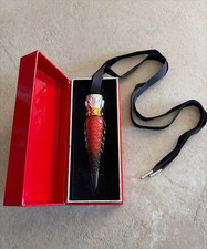 CHRISTIAN LOUBOUTIN - HUILE A LEVRES 