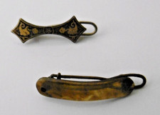 2 Pinces anciennes de poupée