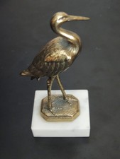 Cigogne en métal doré sur socle en marbre