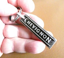 Ancien porte clé métal CHEVIGNON Mode Homme Sweatshirts Blouson..... Marque.