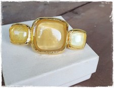 Broche signée  L' Or du Soir