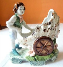  antique polychrome porcelain figure - young boy in shell 