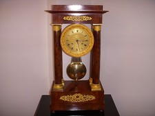 IMPOSANTE PENDULE EMPIRE ACAJOU CUBA COLONNE BRONZE DORE