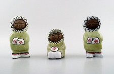 Collection of Upsala-Ekeby art pottery figurines, Eskimo children. Mid-20th C.