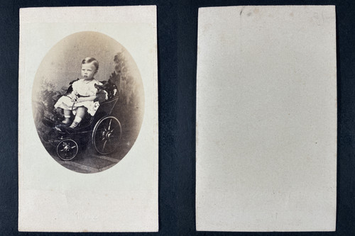 Enfant dans poussette - sa,