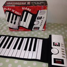 Sharper Image 49 - Piano électronique Key Play 'n' Roll dans sa boîte