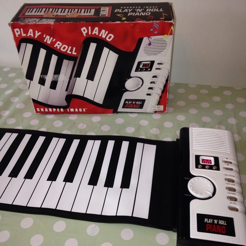 Sharper image piano - 49,