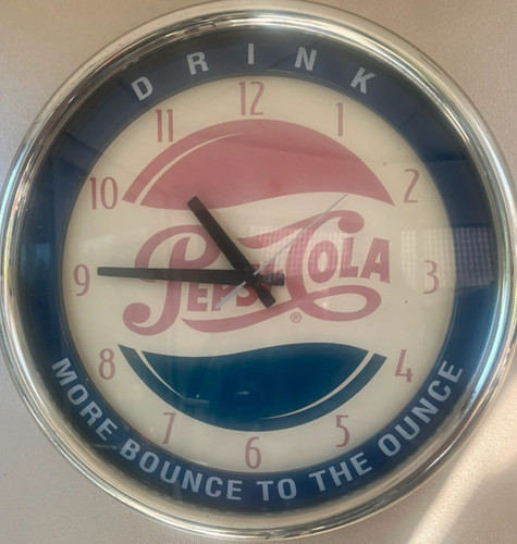 Horloge vintage publicitaire