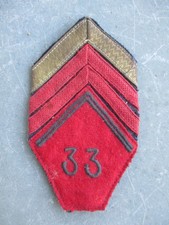Rare insigne militaire 33ème
