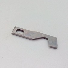 Couteau supérieur surjeteuse