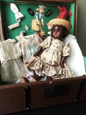 ancienne petite poupée noire Simon Halbig  avec male et trousseau no Jumeau