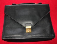 Sac sacoche cartable LANCEL en cuir noir grainé avec clé