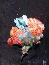 Bird reconstituted in antique multicolored feathers 16 x 15 cm 
