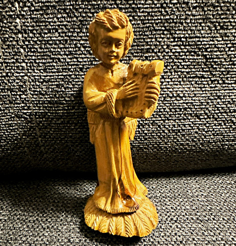 Carved wood boy musician - carved,
