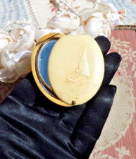 OLD molded galalite bag mirror with sailboat decor circa 1900
