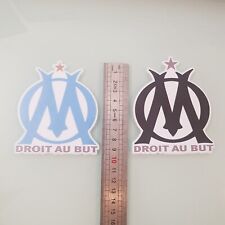 2 stickers OM en cercle de 10