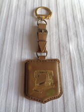 ANCIEN PORTE CLE CUIR  MACHINE