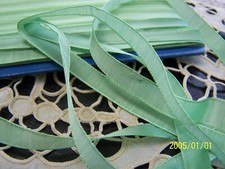Antique light green silk ribbon. Sold by the meter. N°146