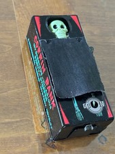 tirelire cercueil mécanique