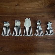 Ensemble ménagère de 30 couverts en inox - forme spirales / tourbillons