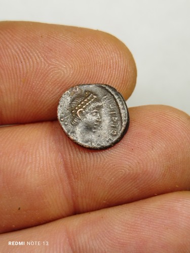 Monnaie romaine à - ,,