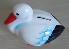 Z* TIRELIRE forme cigogne -