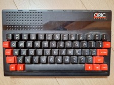 Oric Atmos avec alimentation et cable péritel
