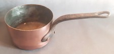 A hammered and tinned copper pan, cast iron handles. Ø15cm height 9cm.