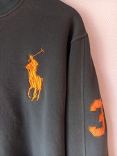 pull de polo gris/vert homme taille M.