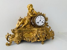 Pendule bronze doré