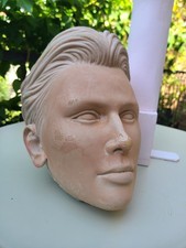 Resin model head with wooden stand. 1960.