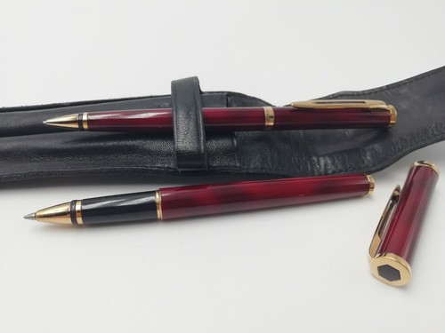 Paire stylos bille - de, et