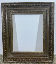 Cadre ancien en bois sculpté