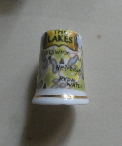 Dé coudre porcelaine - à,