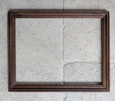 Cadre en bois sculpté