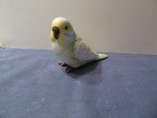 grande perruche en céramique