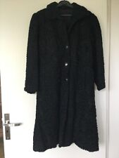 manteau fourrure astrakan