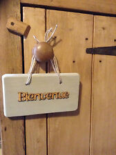 Pendentif de porte en bois