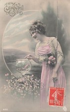 CP 1 APRIL WOMAN ELEGANT FISHING ROD NEAR FISH JAR - 27346